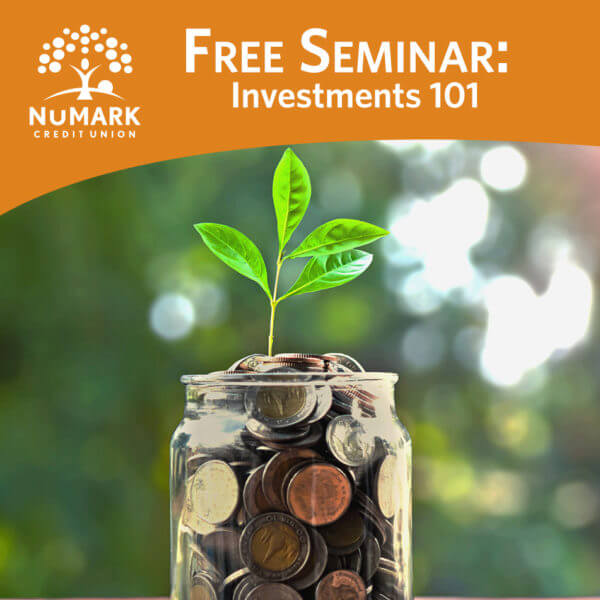 coins in a glass jar with plant growing out of it