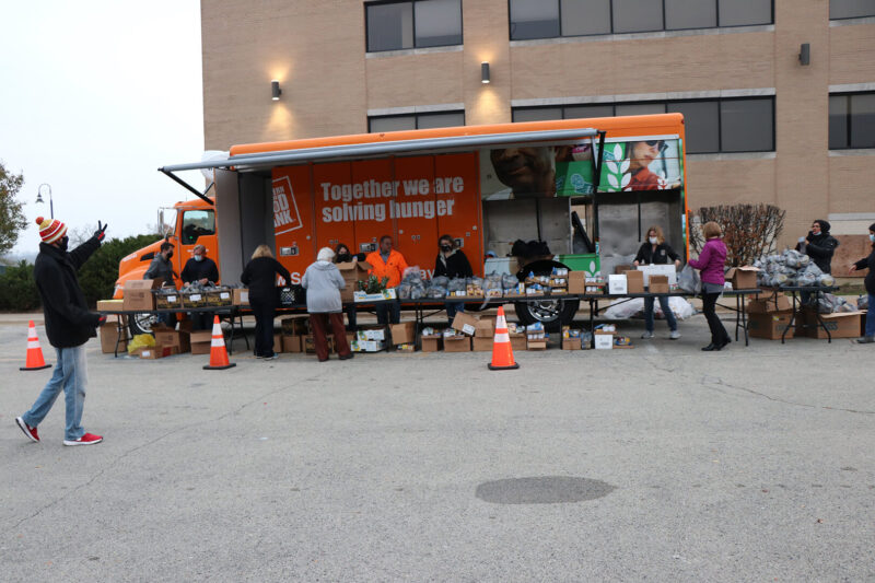 Northern Illinois Food Bank Truck passing out food. 