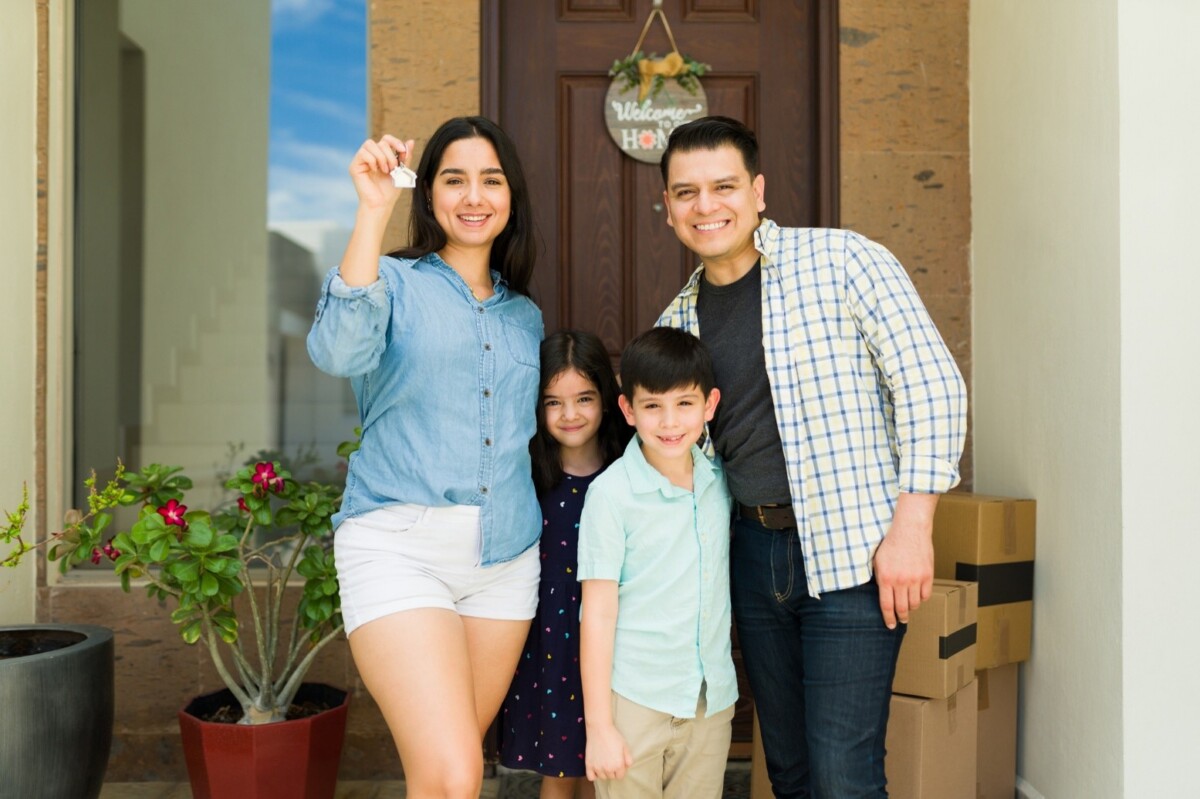 Family outside new home