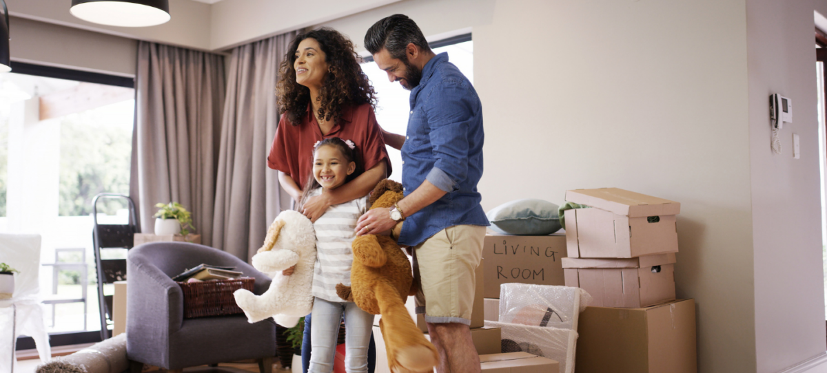 Hispanic family in new home