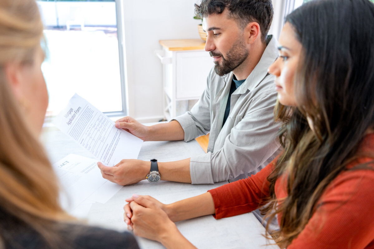 Couple looking at mortgage application