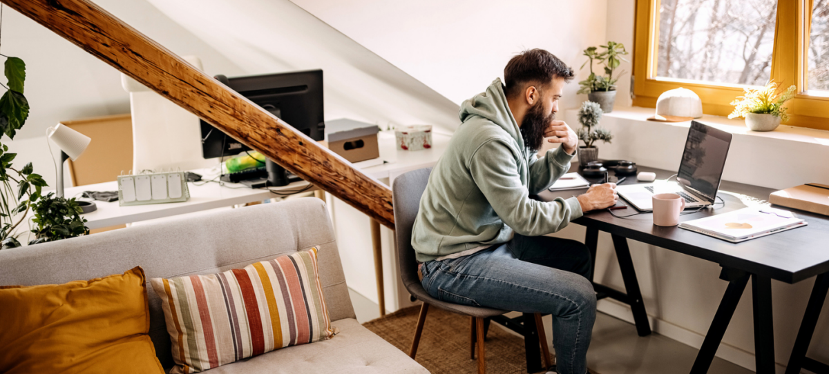 Man at home laptop