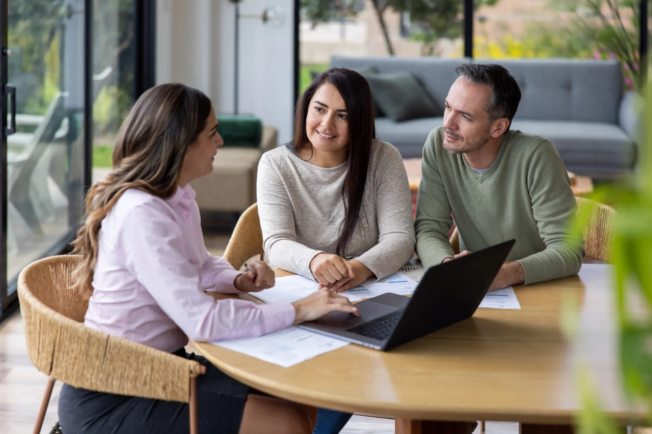 Couple at table with mortgage expert