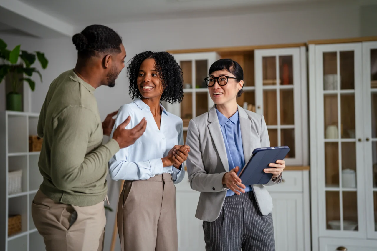 Couple talking to mortgage expert