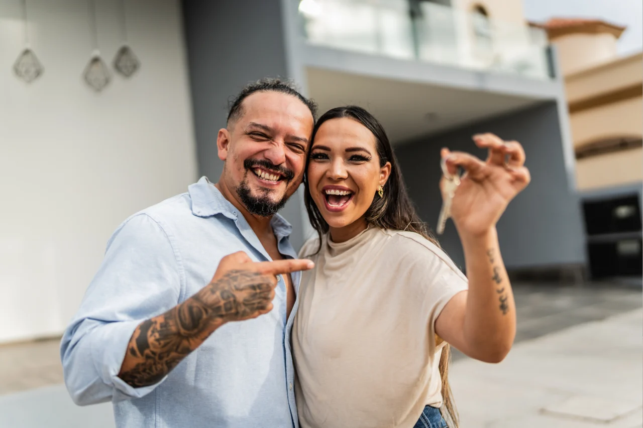 Couple holding keys