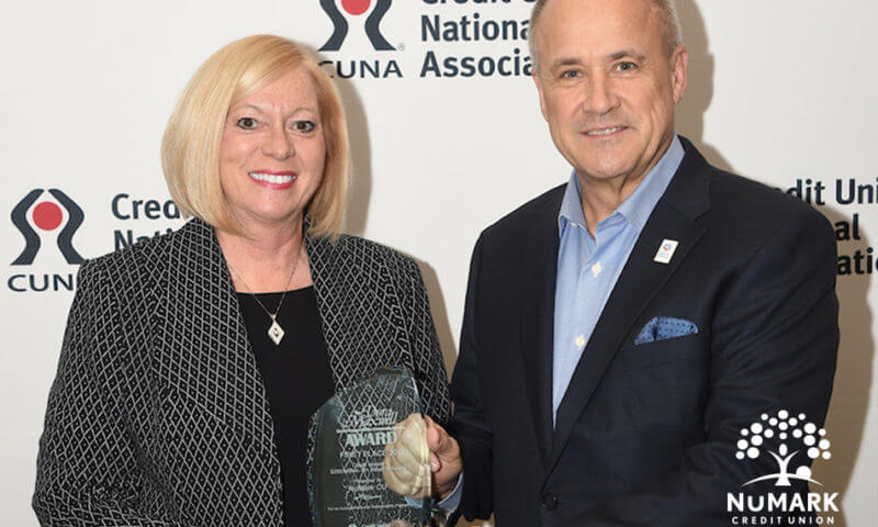 Ann M Dubie PresidentCEO of NuMark Credit Union and Jim Nussle PresidentCEO of Credit Union National Association with 2020 Dora Maxwell Award