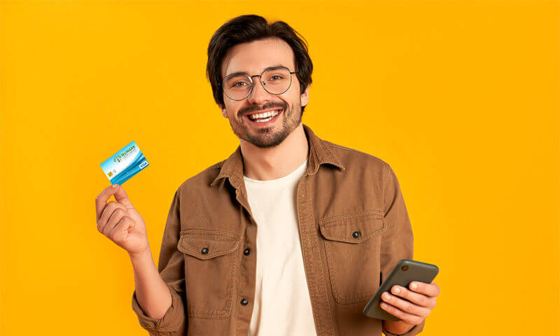 Man holding NuMark debit card